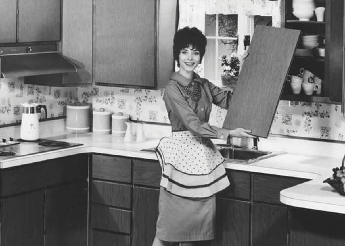 Woman holding cabinet door