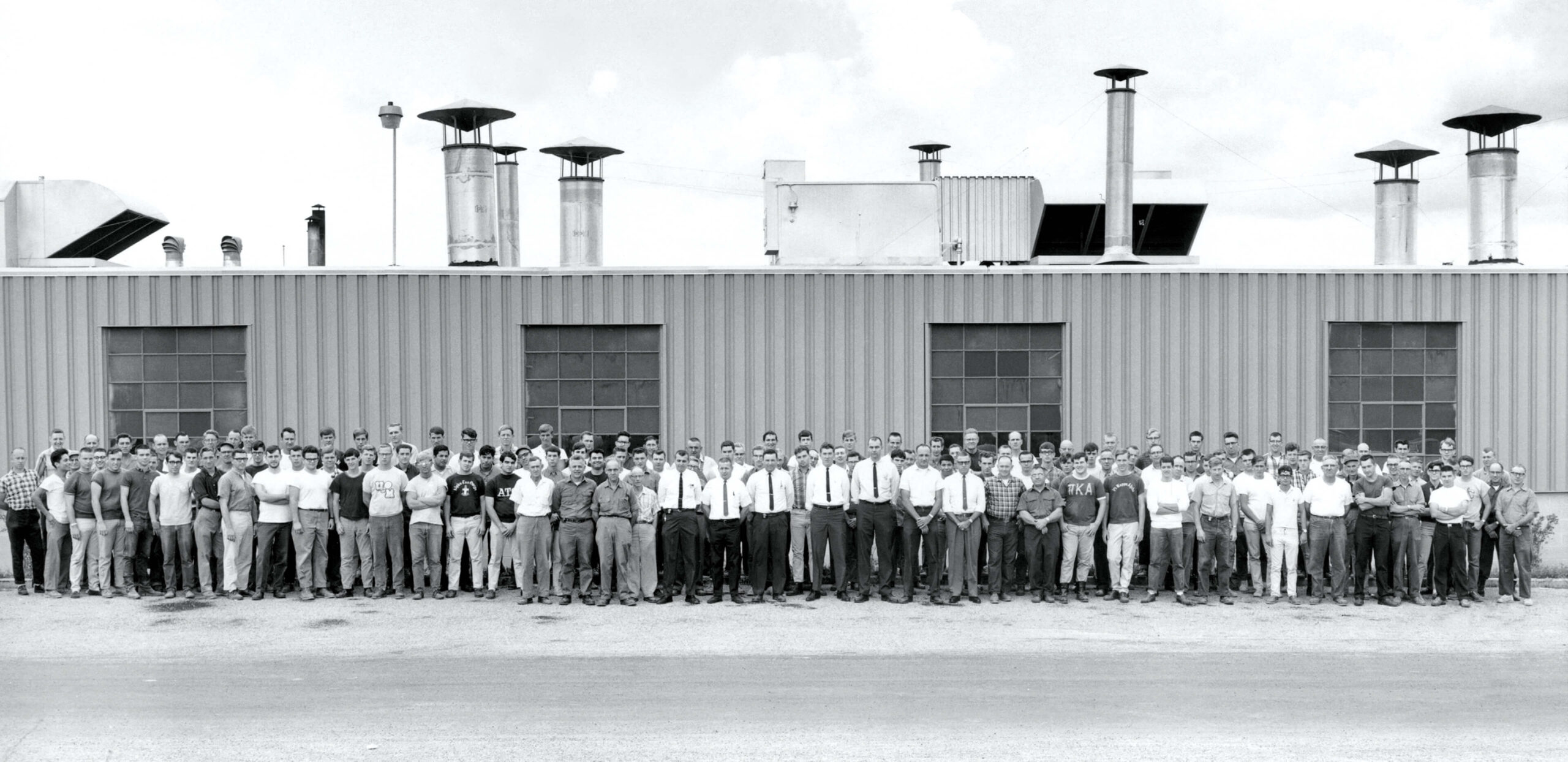 Merillat staff outside of plant in the seventies